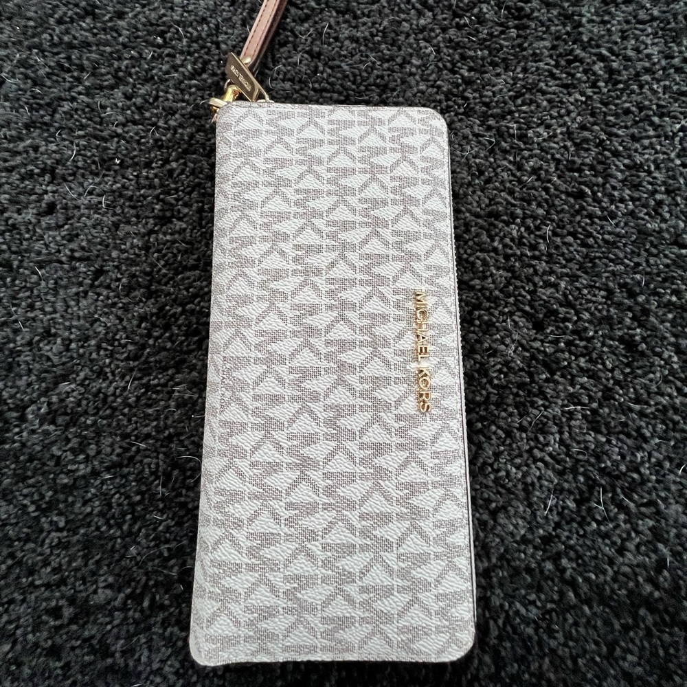 Authentic Michael Kors cream with beige MK wallet wrist list